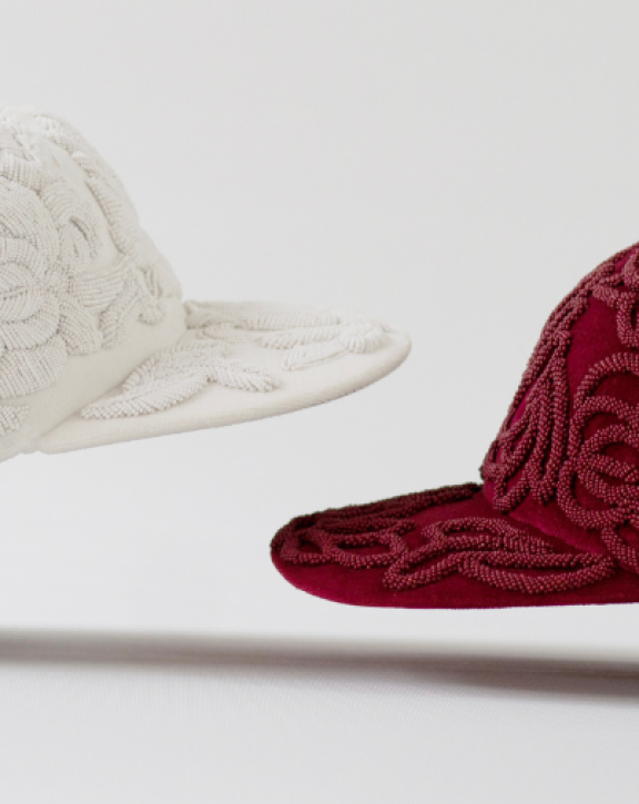 Image of two garnet caps by Giuseppe Savoca