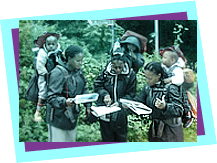 Three young mothers, with their children, map reading Three young mothers, with their children, map reading