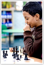 Boy playing chess Boy playing chess