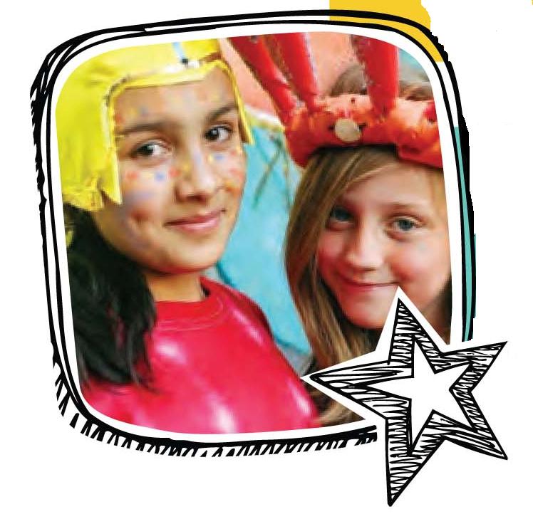 two girls wearing face paint and handmade hats
