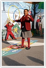 Girl playing hoola hoop