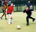 children playing football