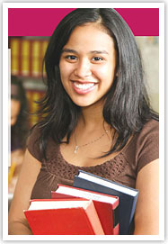 girl holding books smiling girl holding books smiling