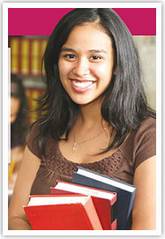 girl holding books smiling