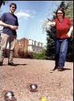 people playing petanque people playing petanque