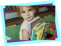 little girl with books in her hand
