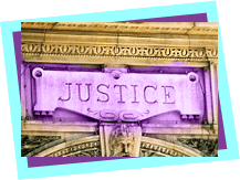 A 'Justice' sign from outside a court house