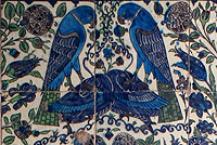 Tiles showing birds with their necks cut at Leighton House Museum