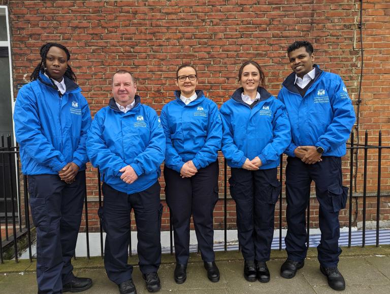Five members of the street enforcement team side by side in blue uniform 