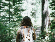 Woman walking through park