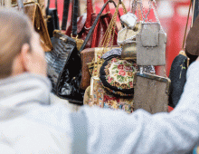 Woman at market stall