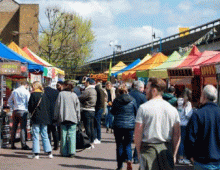 People at a market stall