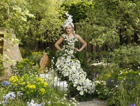 Female model wearing a dress made of flowers in the M&G Garden Thumbnail