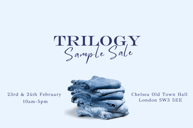 Event poster for the Trilogy Sample Sale showing a neatly folded stack of blue denim jeans.