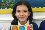 Young pupil holding Go Golborne promotion leaflet Young pupil holding Go Golborne promotion leaflet