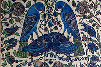 Tiles showing birds with their necks cut at Leighton House Museum Tiles showing birds with their necks cut at Leighton House Museum