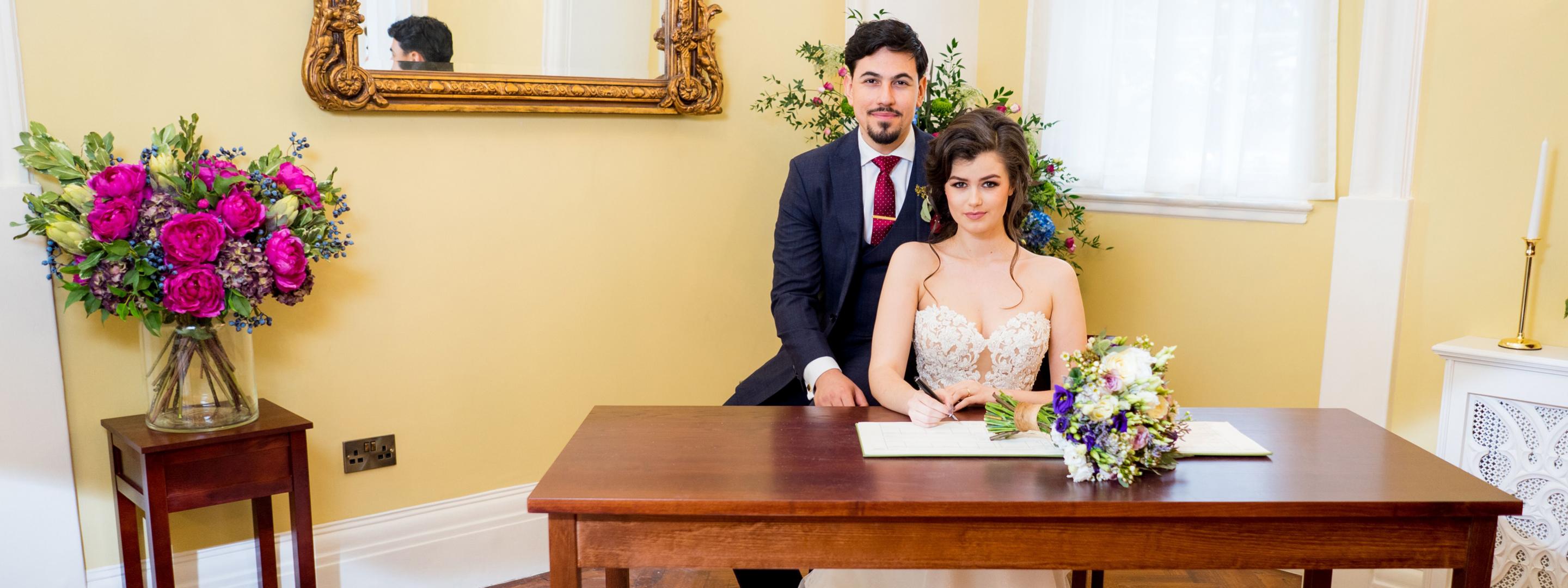 couple-signing-register