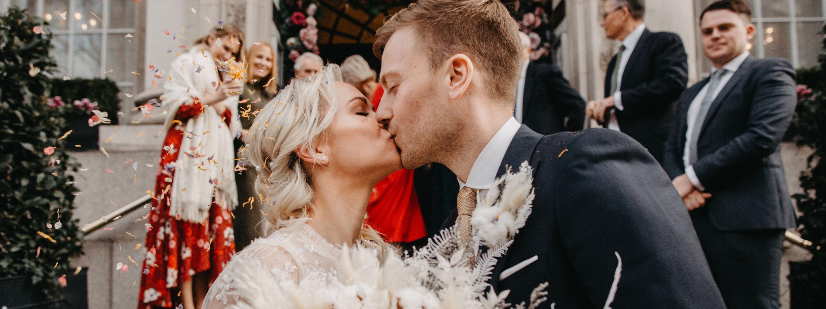 a man and a woman kissing