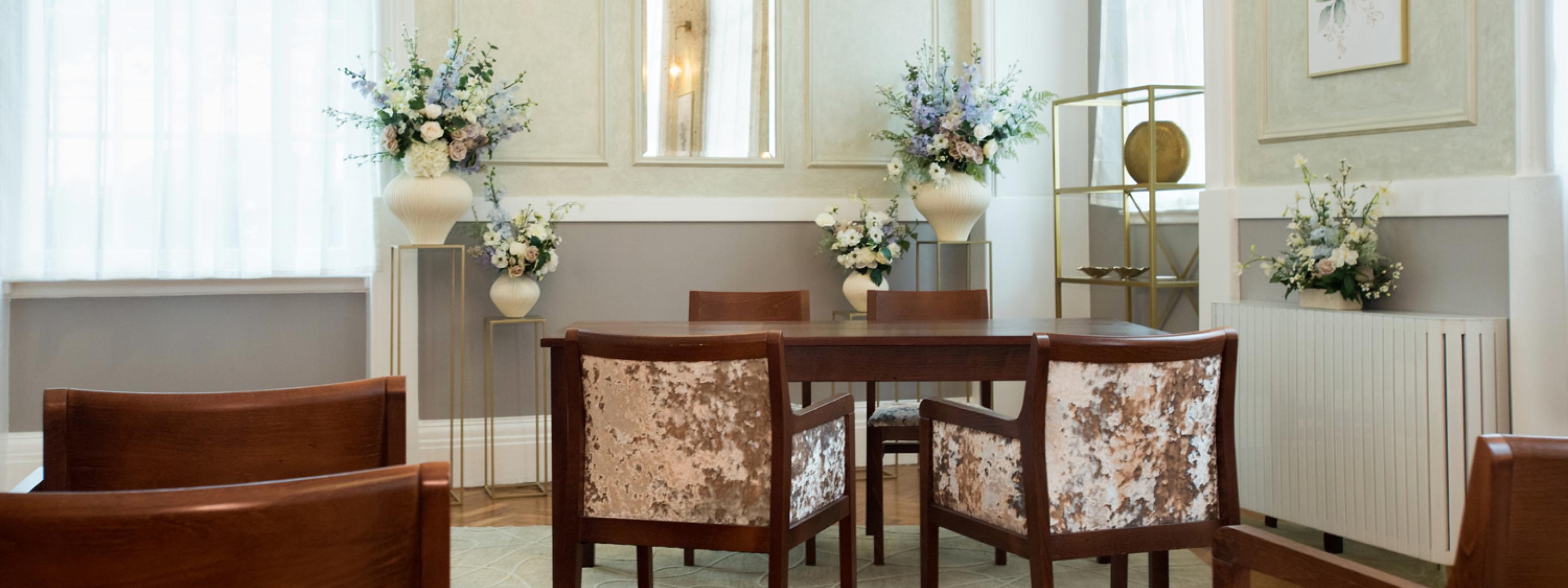 A close view of the signing table and chairs in the Brydon room