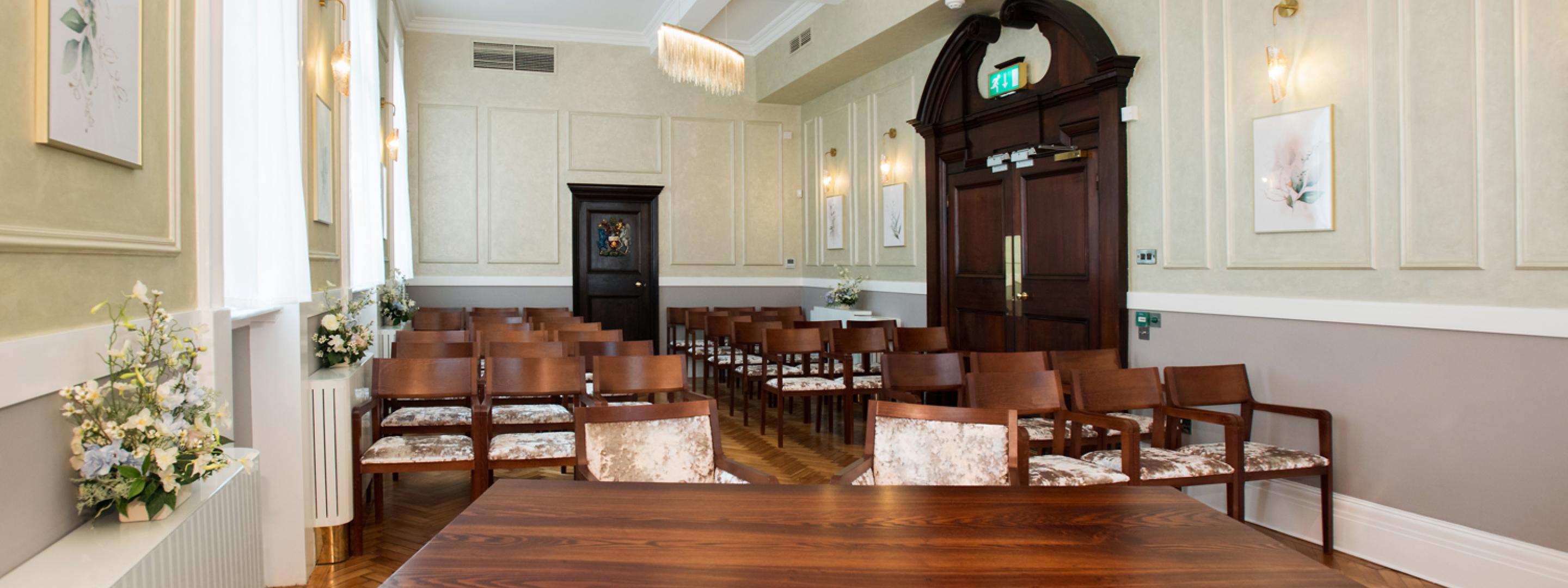 The Brydon room showing the signing table and chairs of the congregation