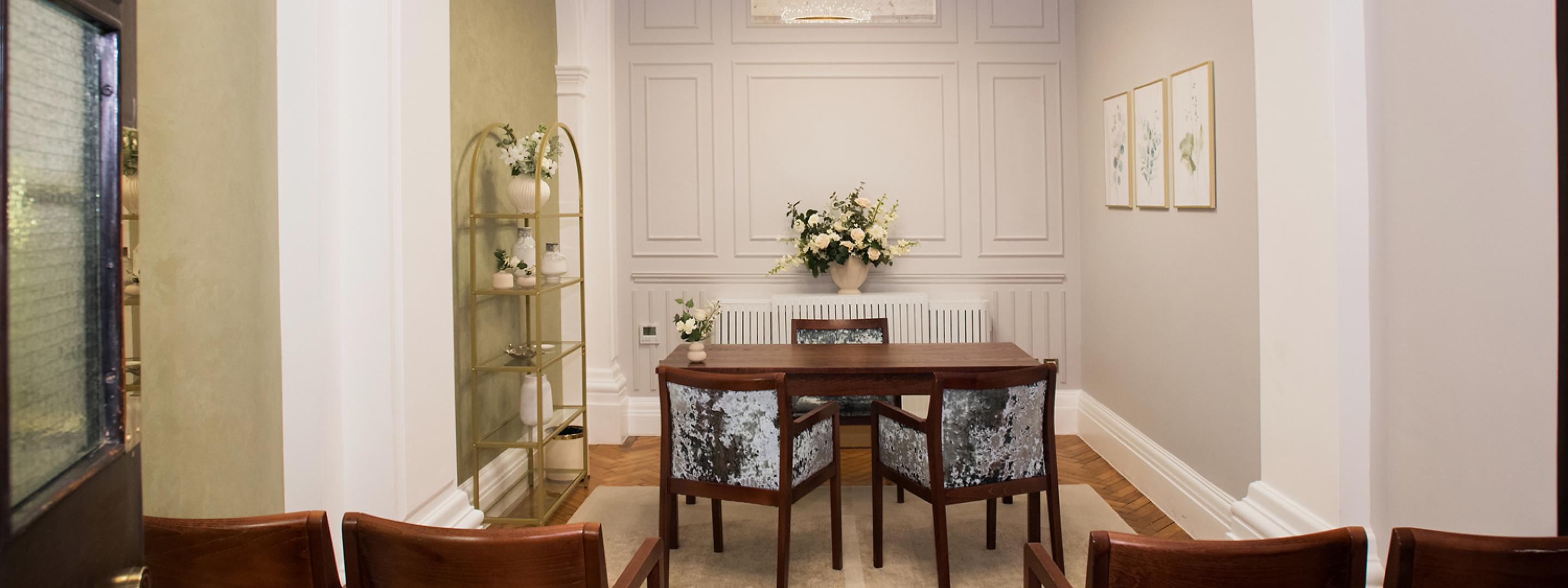 Guest view of the picture table and chairs in the Harrington room