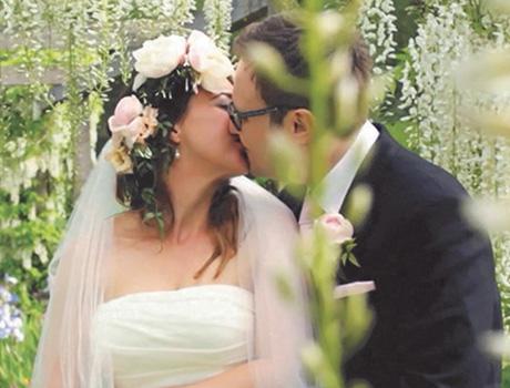 Newly wed couple kissing