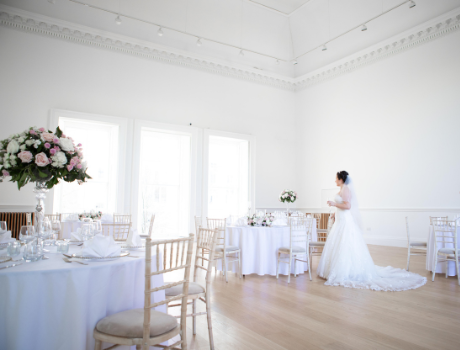 Bride in room set up for wedding celebration