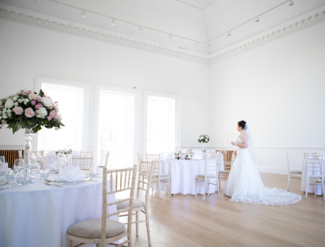 Bride in room set up for wedding celebration 