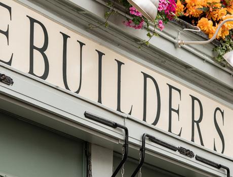 External sign of a pub called builders arms