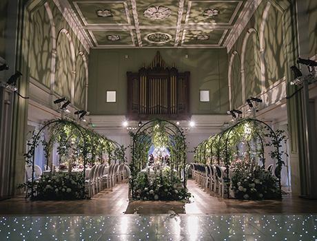 a grand hall with tables