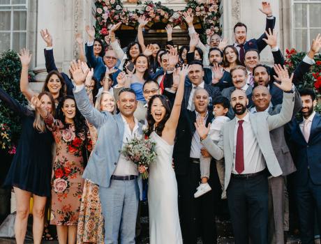 A group of people waving