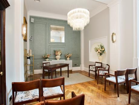 Aerial view of Rossetti room showing seating, feature wall, and lighting.