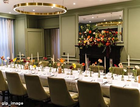 A green room with a table setting