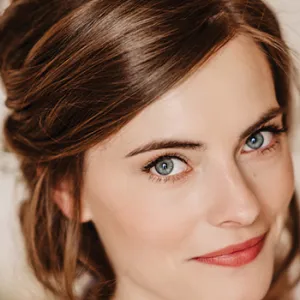 Headshot showing woman's hairstyle