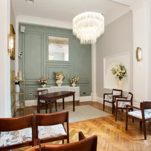 Aerial view of Rossetti room showing seating, feature wall, and lighting.