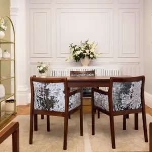 Close view of the picture table and chairs in the Harrington room