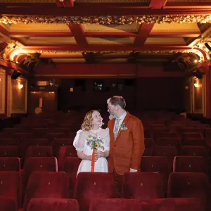 A couple in an elegant cinema
