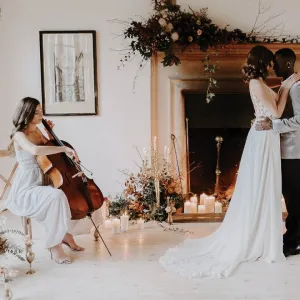 A cellist and a dancing couple