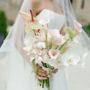 A bride holding a beautiful bouquet of flowers