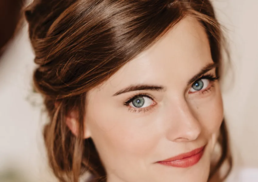 Headshot showing woman's hairstyle