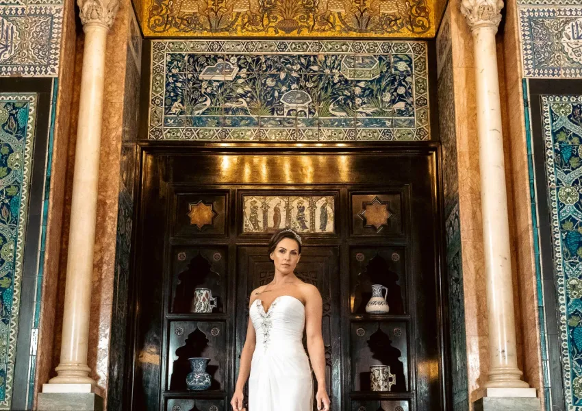a woman wearing a white dress