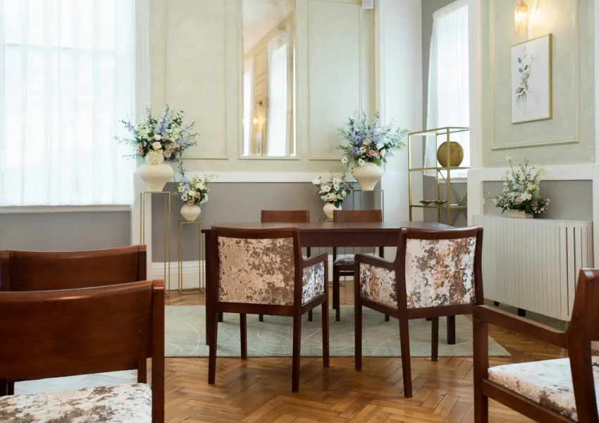 A close view of the signing table and chairs in the Brydon room