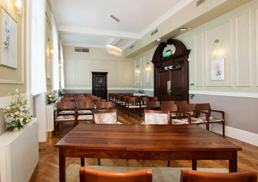 The Brydon room showing the signing table and chairs of the congregation