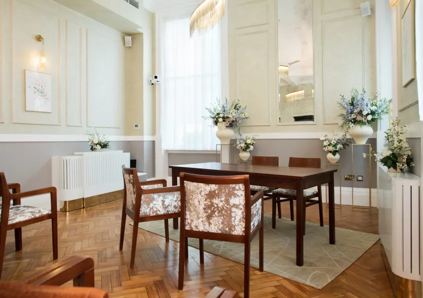Floral display in the corner of the Brydon room around the signing table.