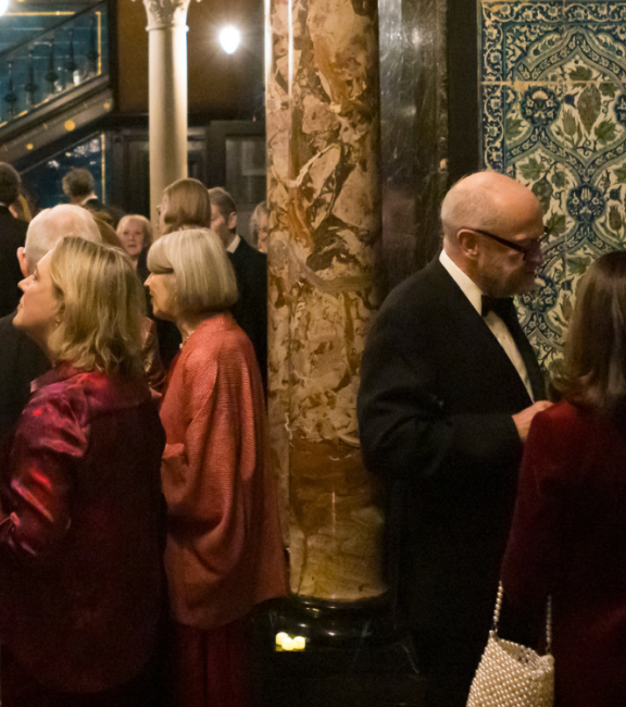 Guests in the Arab Hall at Leighton House