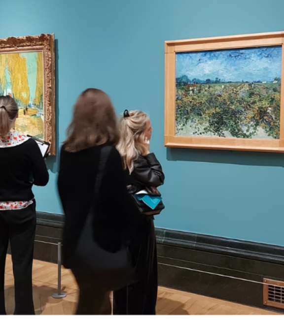 Visitors looking at Van Gogh artworks at the National Gallery