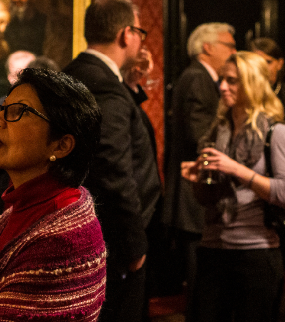 Guests enjoy a drinks reception in Leighton's dining room