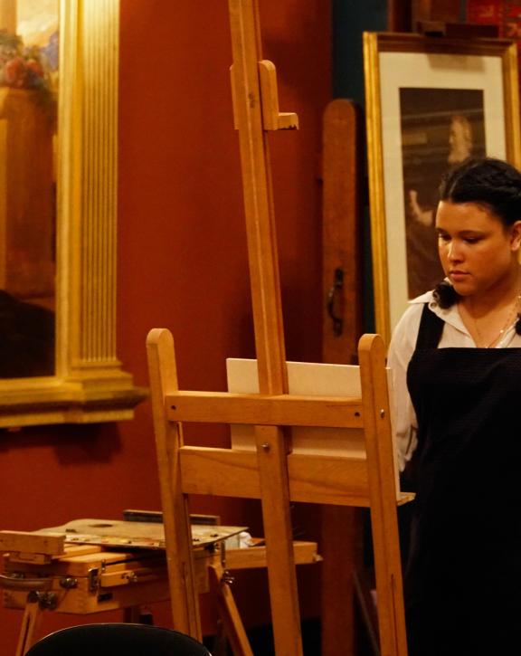 A young lady drawing in Leighton's studio