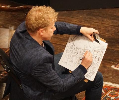 Man drawing in the studio at Leighton House