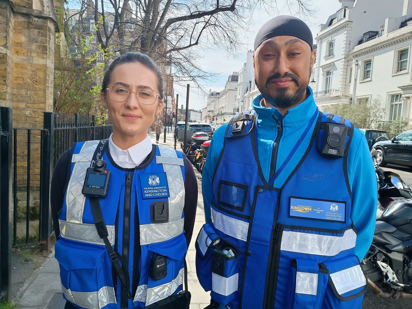 Two uniformed street enforcement officers